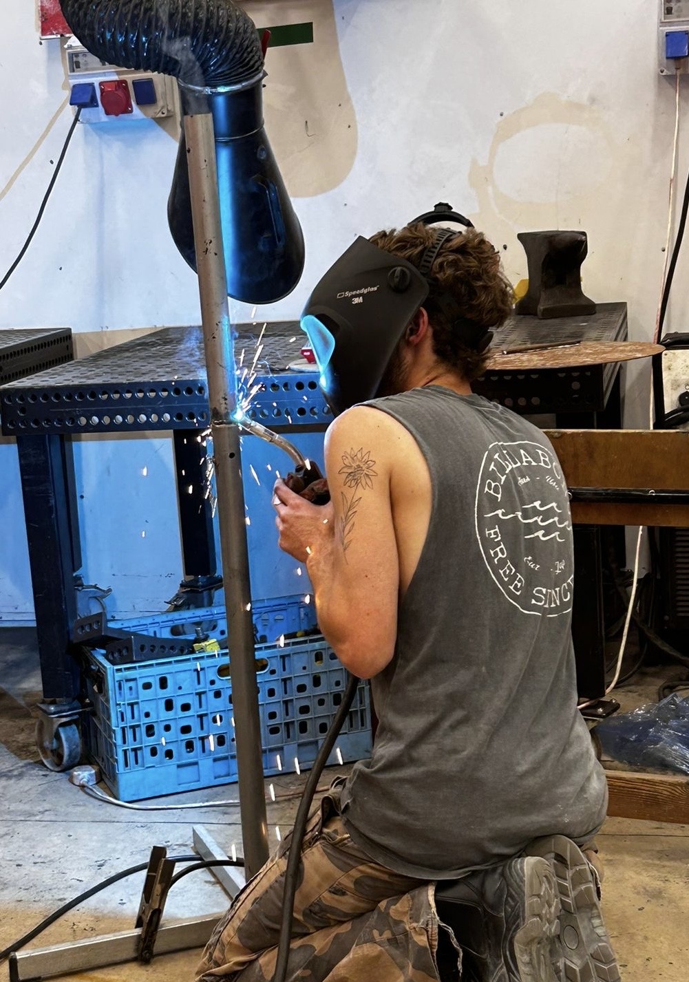 Welding a steel structure in the metal workshop